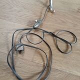 Golden and black tripod floor lamp