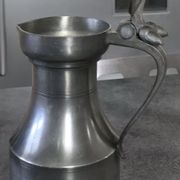 Antique pitcher with shoulder in fine punched tin finish pcorn