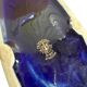 Blue earthenware planter decorated with gold motifs