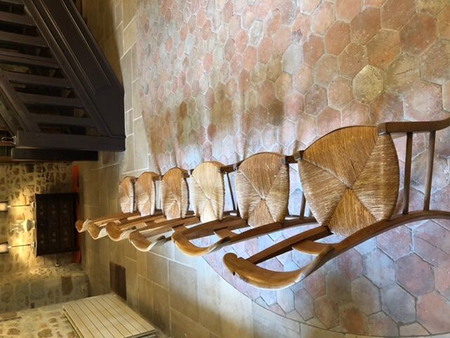 Solid oak table with 3 extension cords, 6 oak chairs with straw seat