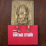 Scarab brass mail clip