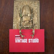 Scarab brass mail clip