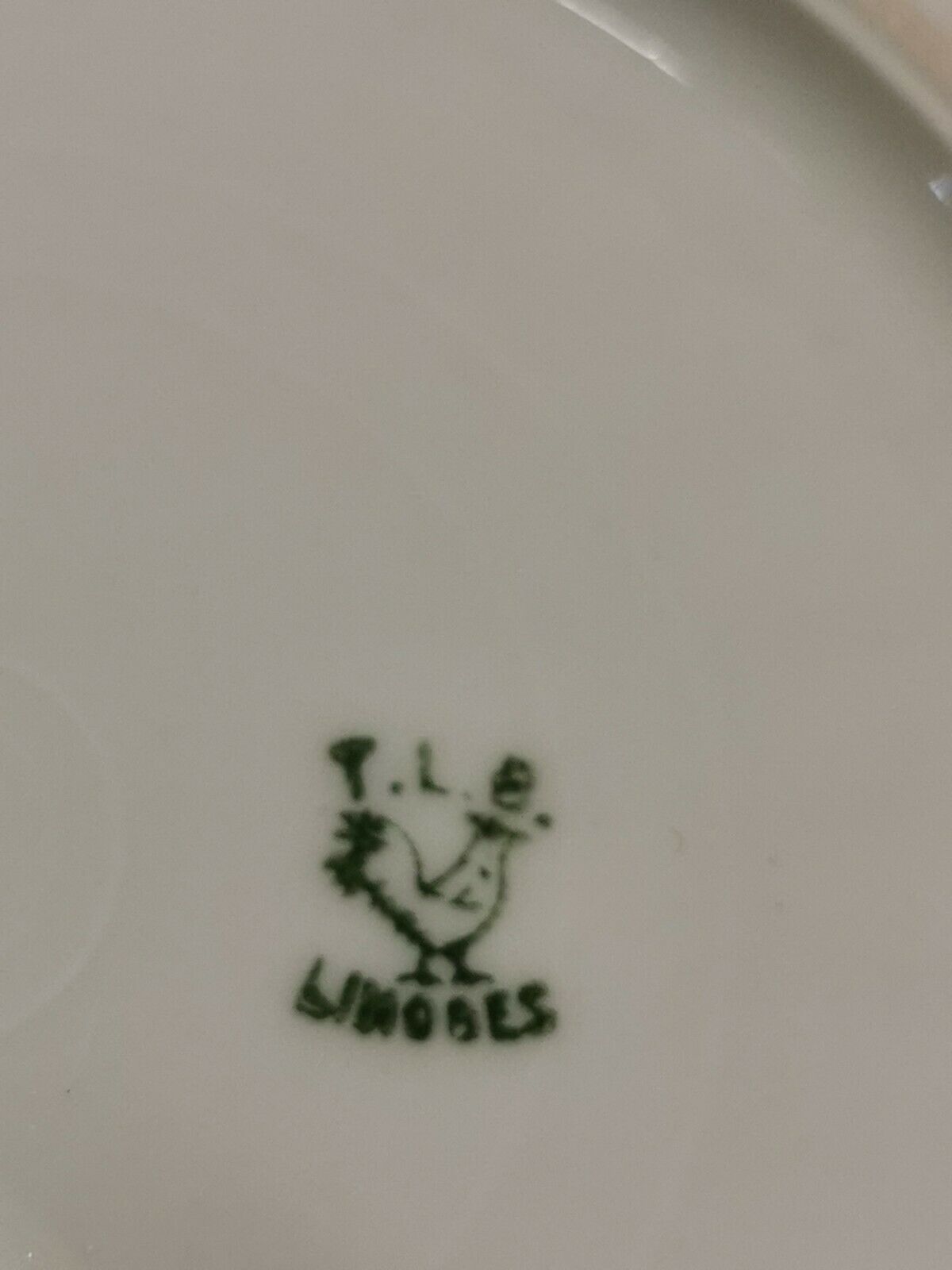 Limoges porcelain cake service. T. L. B.