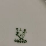 Limoges porcelain cake service. T. L. B.
