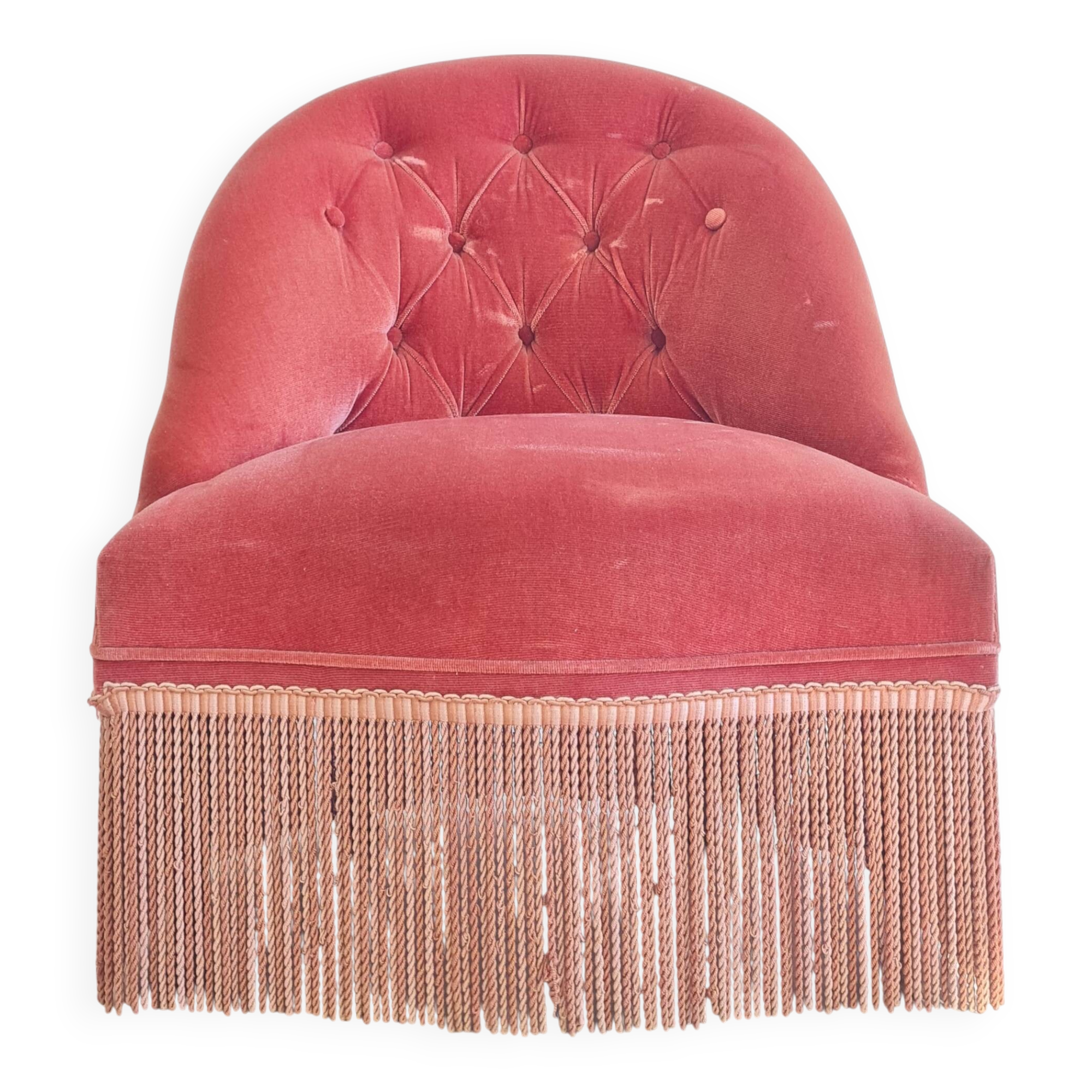 Fauteuil crapaud rose capitonné avec franges