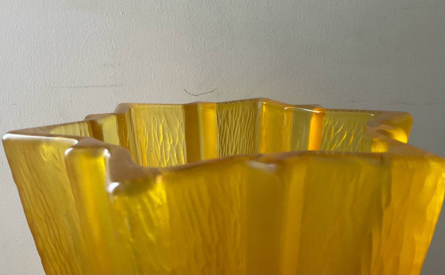 Art Deco star vase in yellow glass from the 1950s