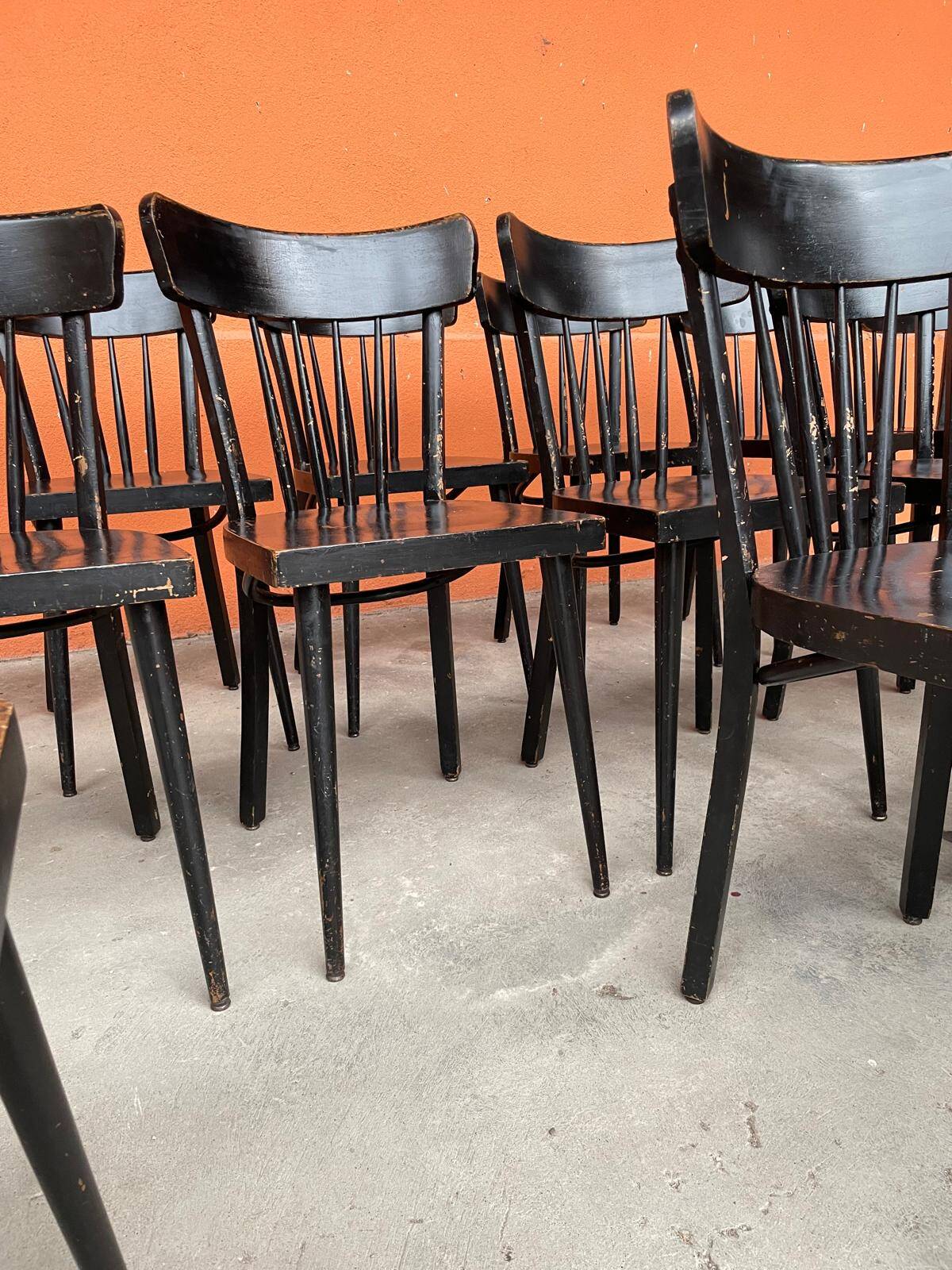 Set of 18 curved wooden bistro chairs with patina from the 60s