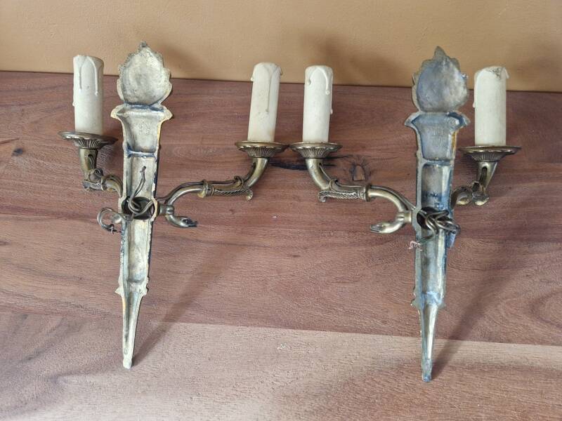 Pair of Empire style wall sconces in gilded bronze and green lacquer.