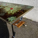 Vintage ceramic coffee table, floral patterns and chrome base.
