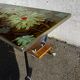 Vintage ceramic coffee table, floral patterns and chrome base.