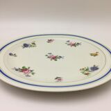 Plat de service rond “ lourioux foëcy “avec motifs de fleurs.