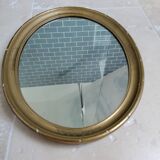 Oval mirror in gilded stucco 45 cm