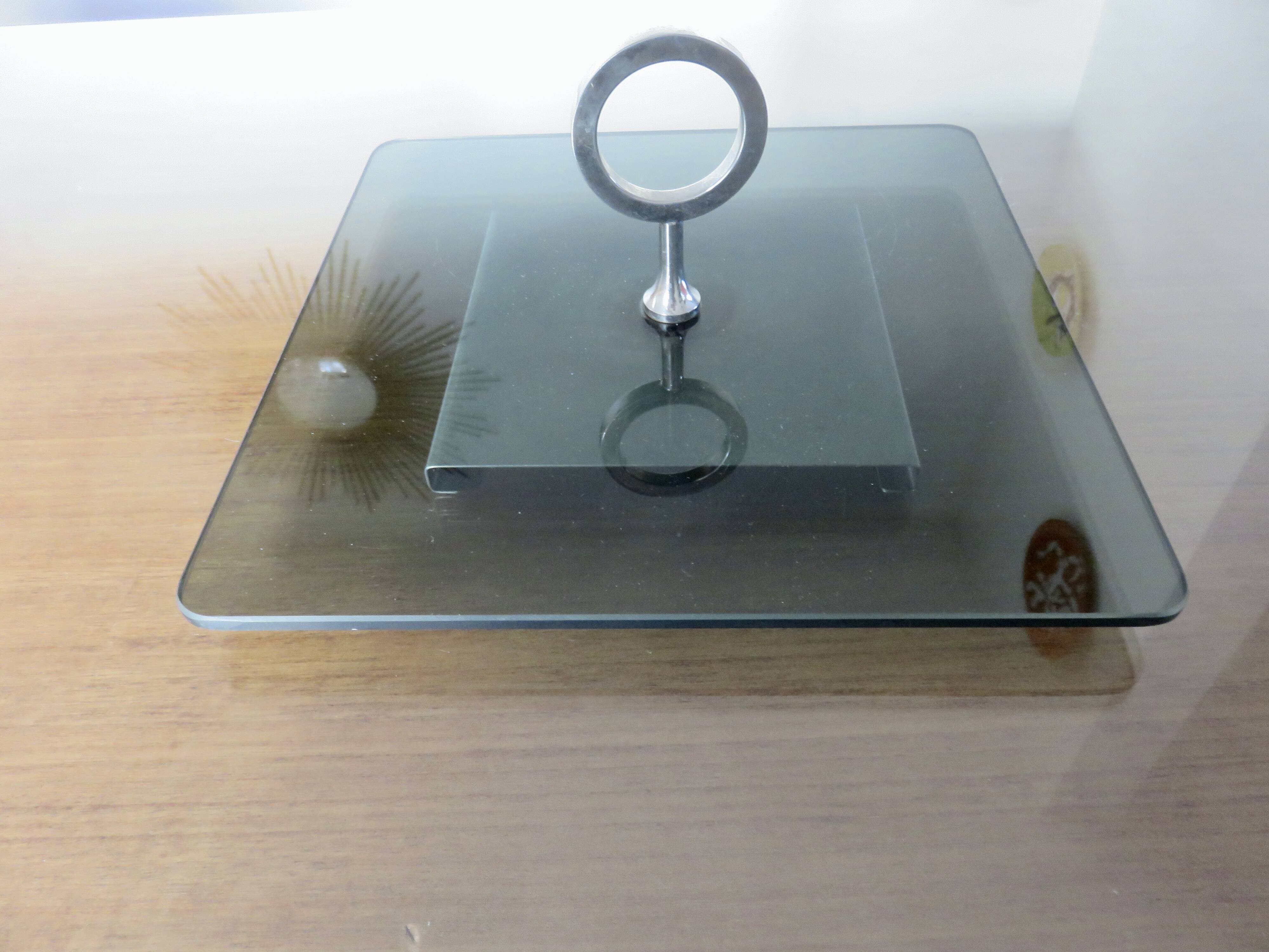 Modernist revolving serving tray, in smoked glass and silver-plated metal, 70.