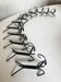 Set of 12 raw iron knife rests 1970