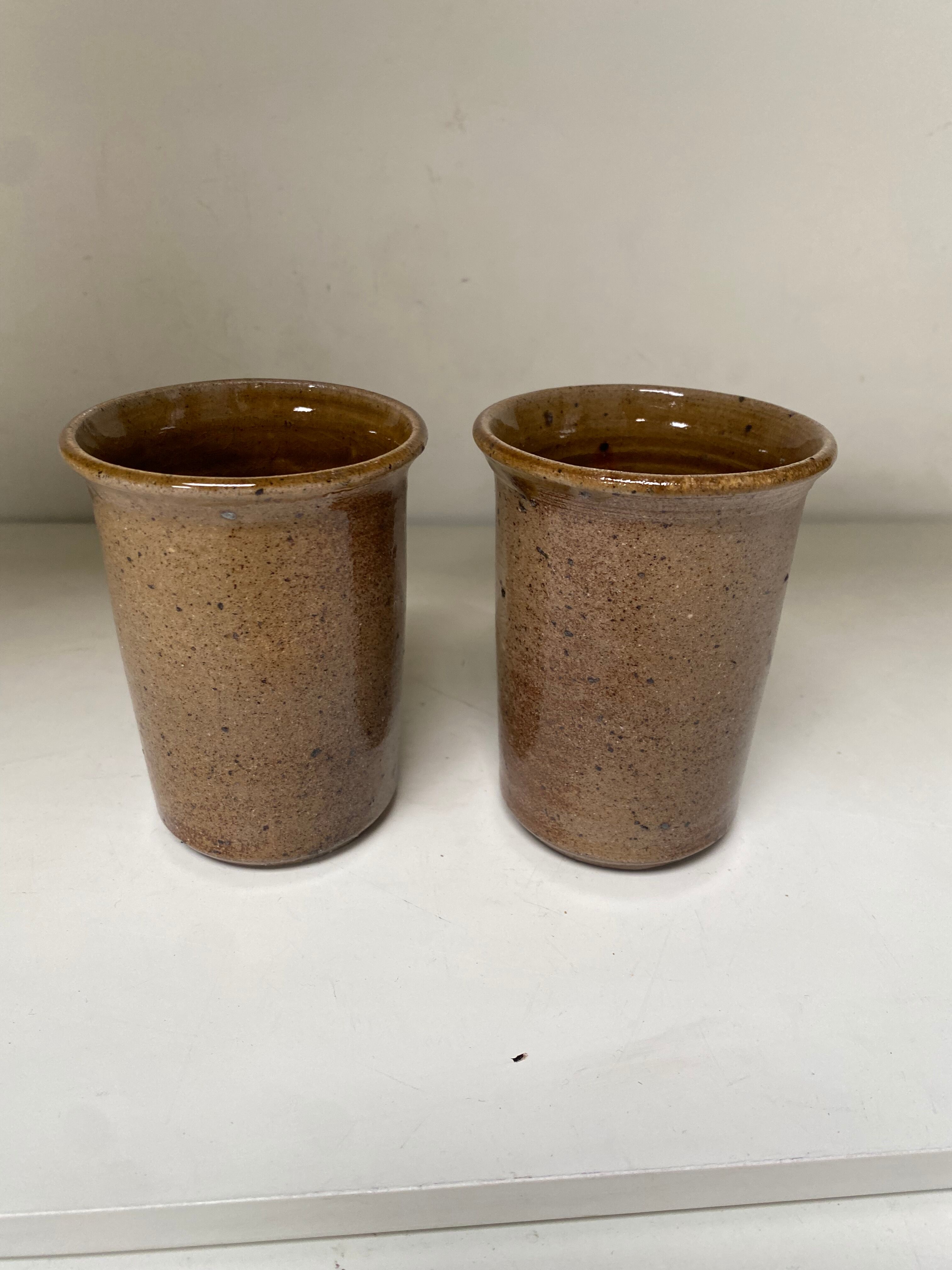 Pair of sandstone mugs