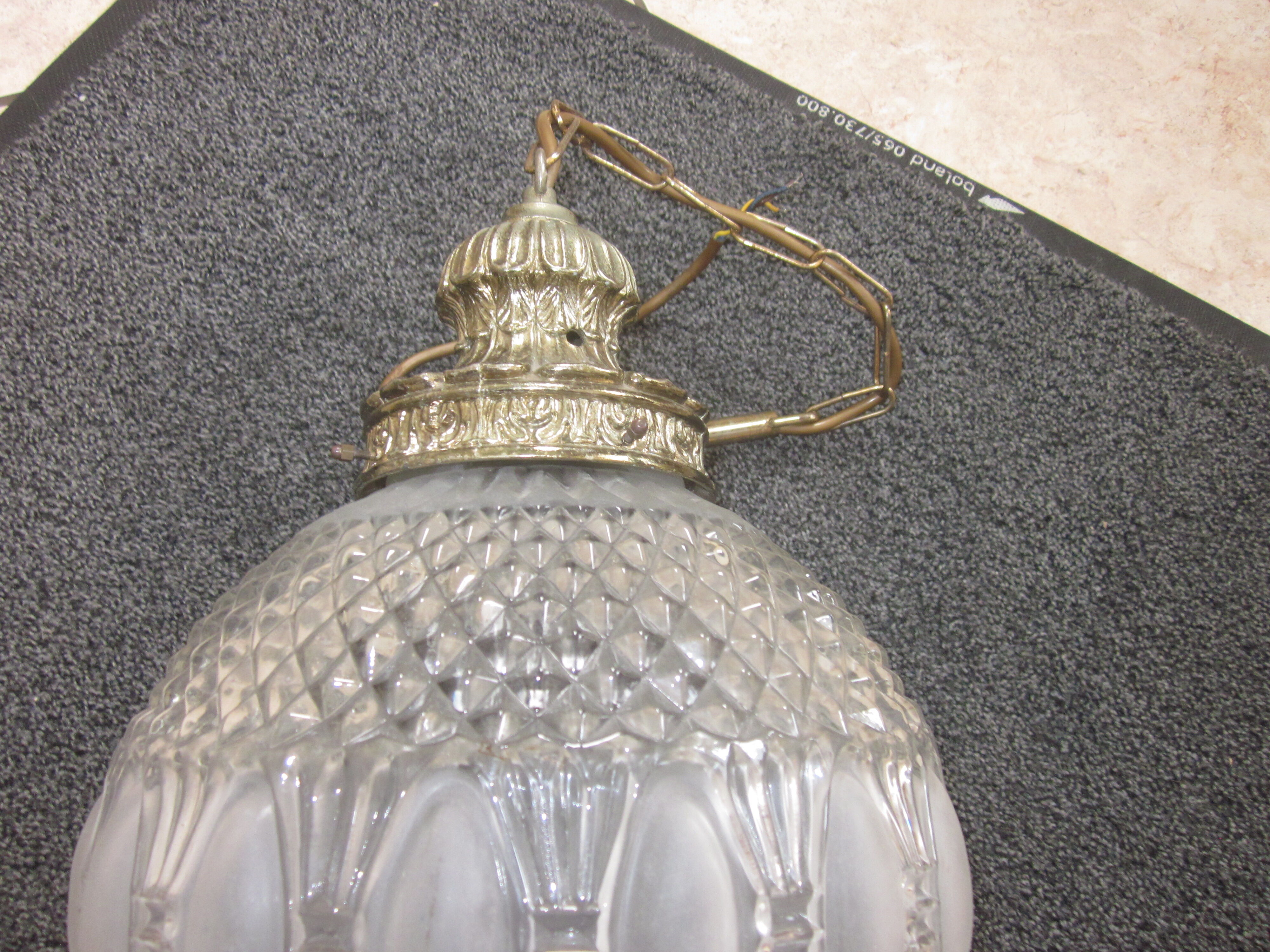 Glass and brass hallway hanging