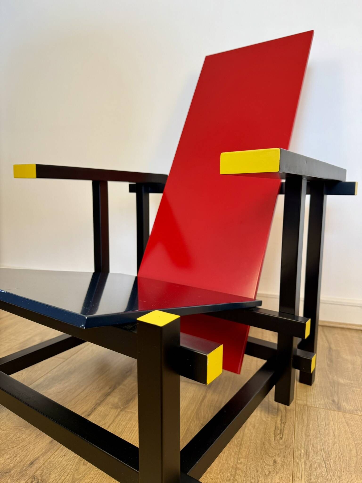 Red and Blue Chair in the Style of Gerrit Rietveld – De Stijl Movement