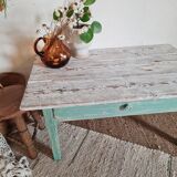 Wooden farmhouse coffee table green base