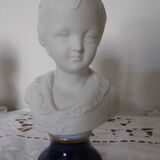 Pair of busts of children made of porcelain biscuits