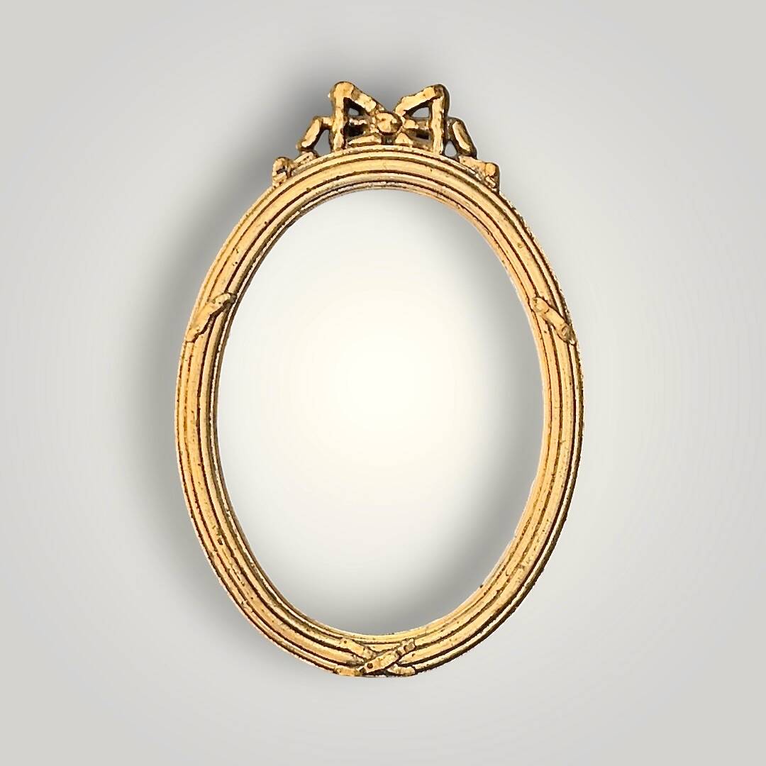 Antique oval wall mirror in gilded resin – Louis XVI knot –