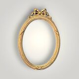 Antique oval wall mirror in gilded resin – Louis XVI knot –