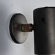 Adjustable black metal wall sconces from the 1960s.