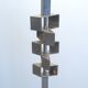 Floor lamp with a large orange shade and metal from the 1960s.