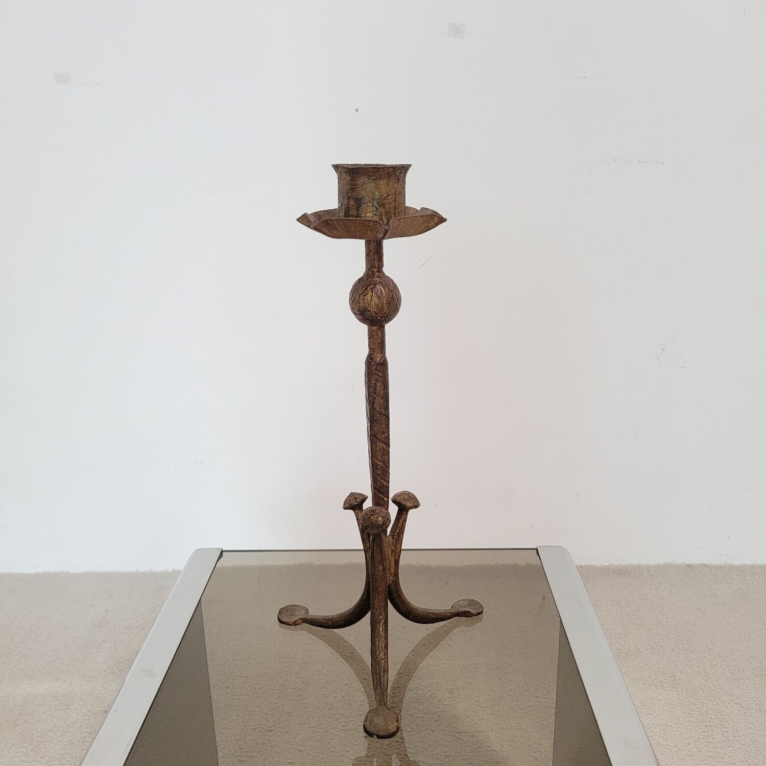 Candle holder in hammered metal with golden patina from the 70s