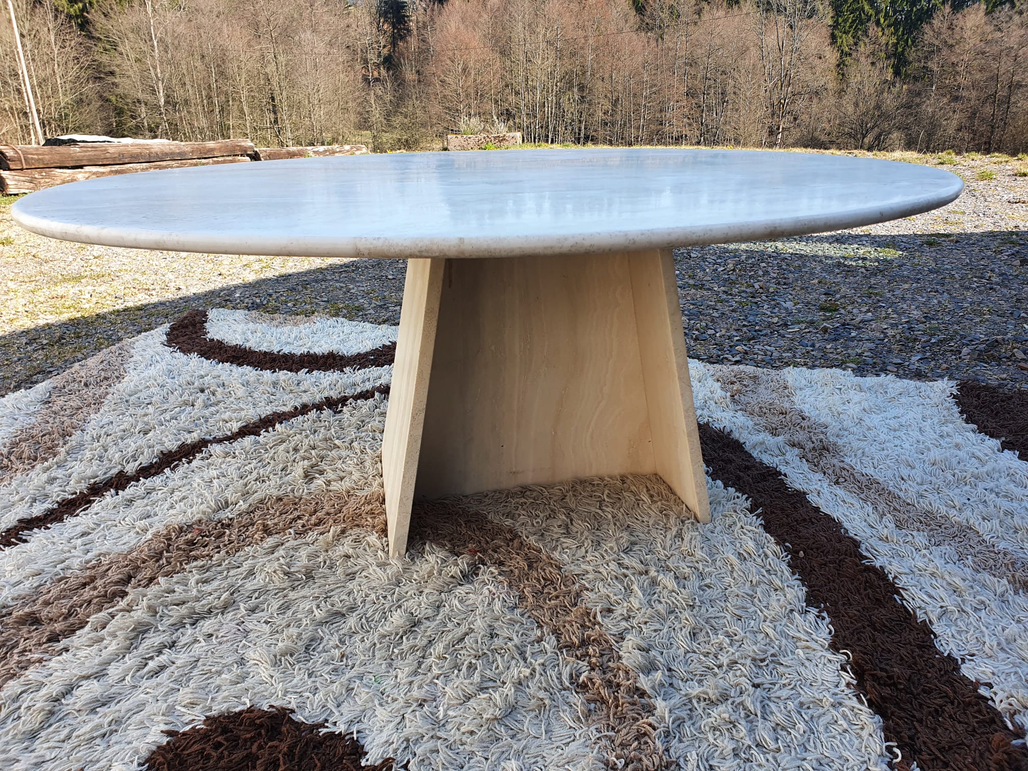 Oval travertine coffee table