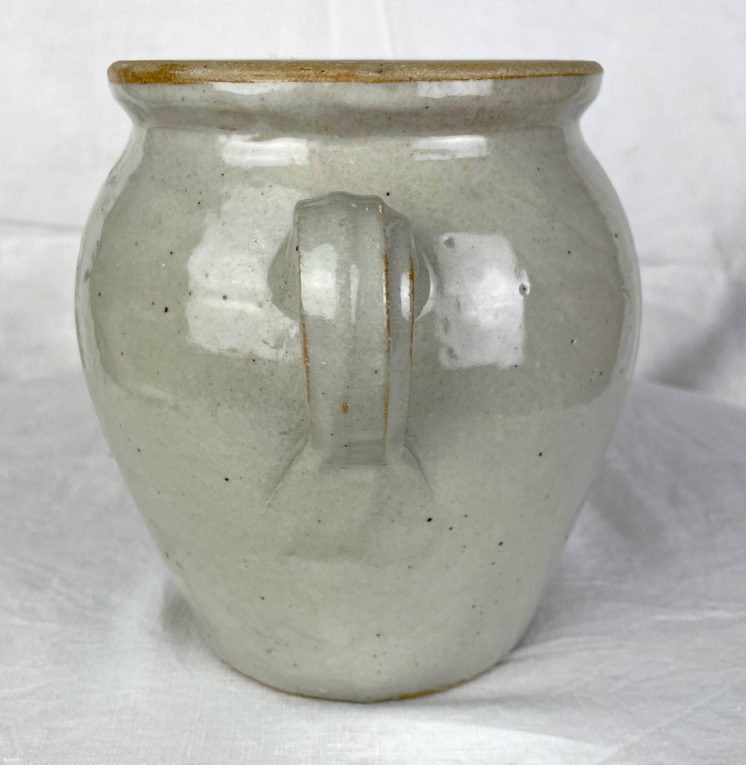 Earthen grease pot