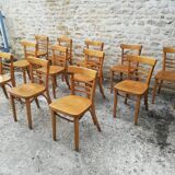 12 varnished bistro chairs