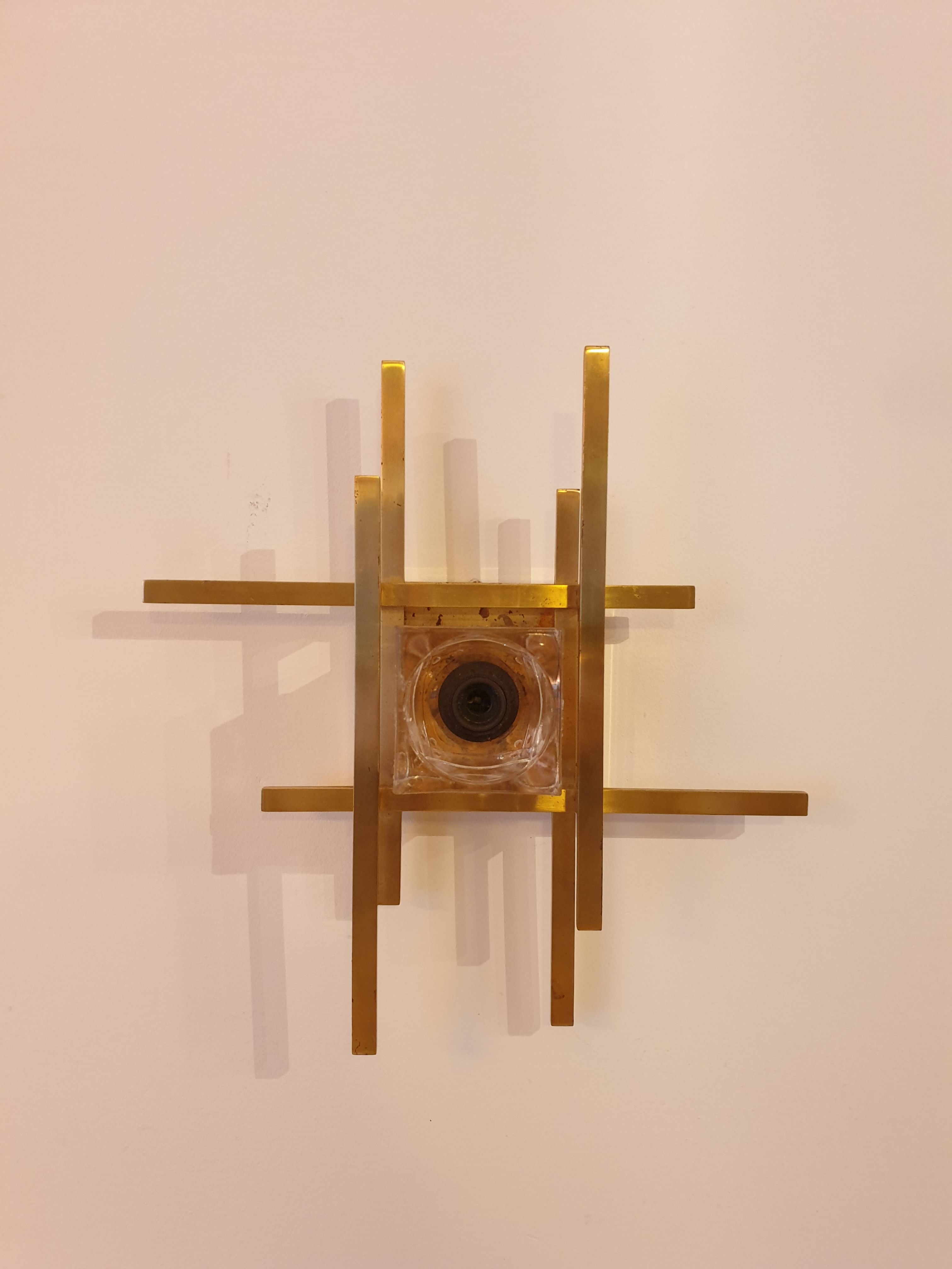 Pair of brass wall lamps from Sciolari