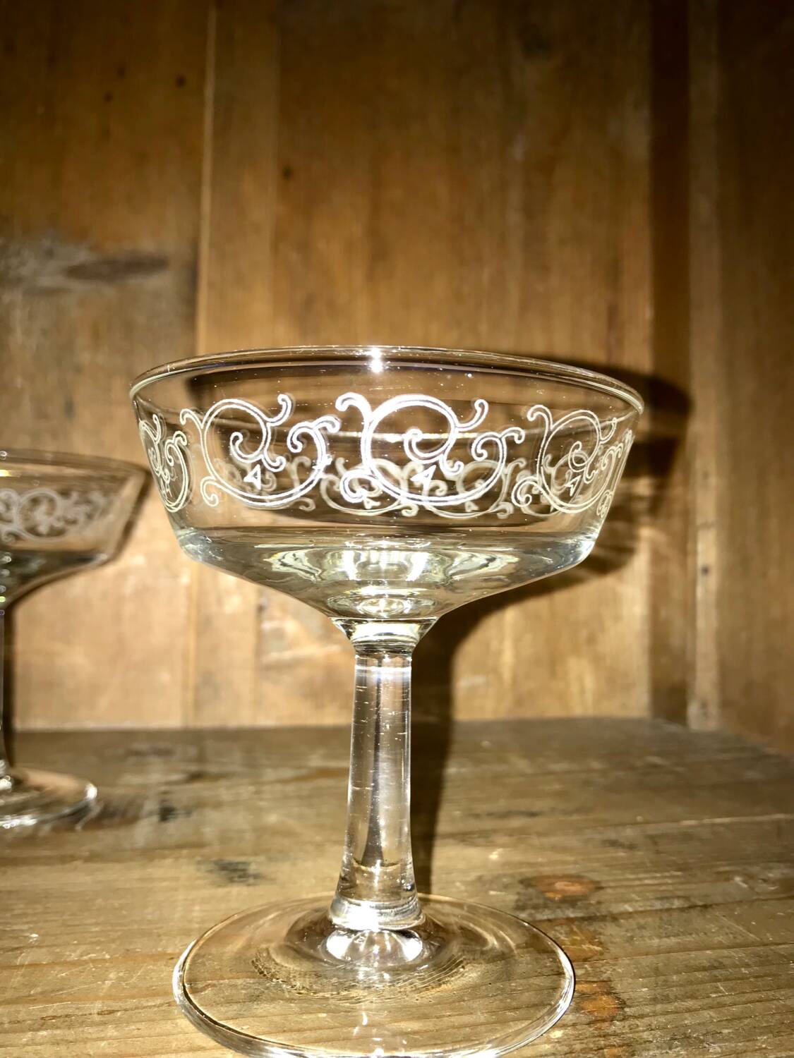 Set of old glasses with white arabesque pattern
