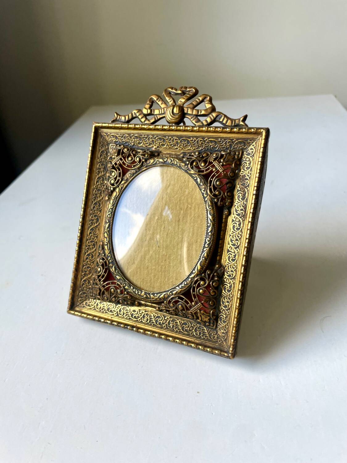 Antique metal frame gold coloured brass   frame 10.5 cm x 9 cm  convex glass