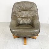 Brutalist oak and leather swivel chair, 1970s
