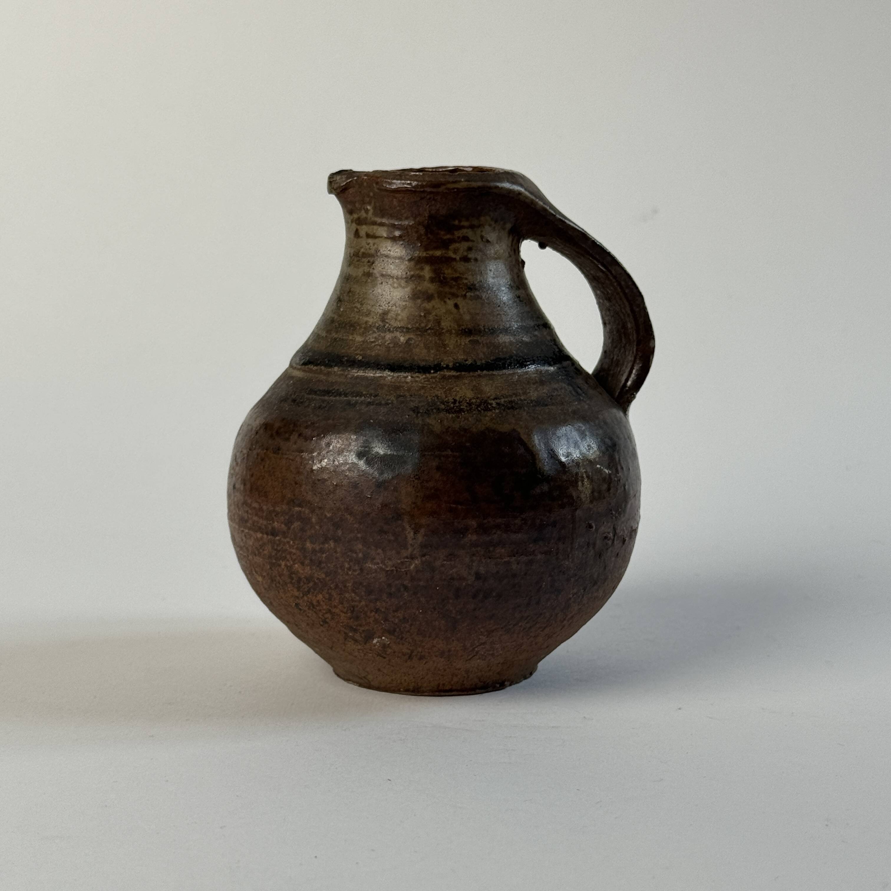Pair of small Jacky Coville stoneware pitchers, 1970
