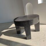 Quadripod coffee table in black monoxyl solid wood