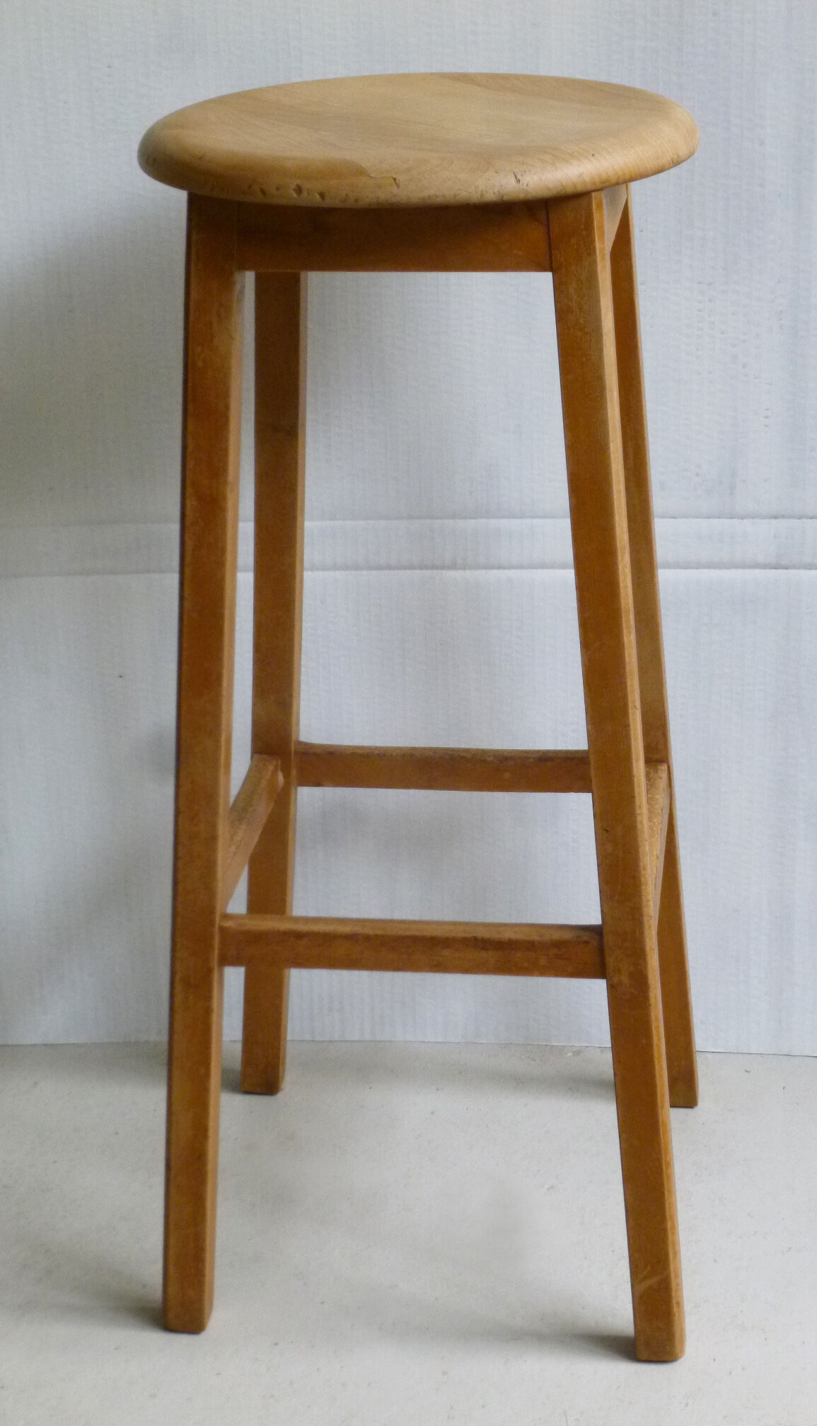 High wooden stool