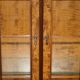 Vintage walnut burr buffet with glass and lighting, Art Deco style.