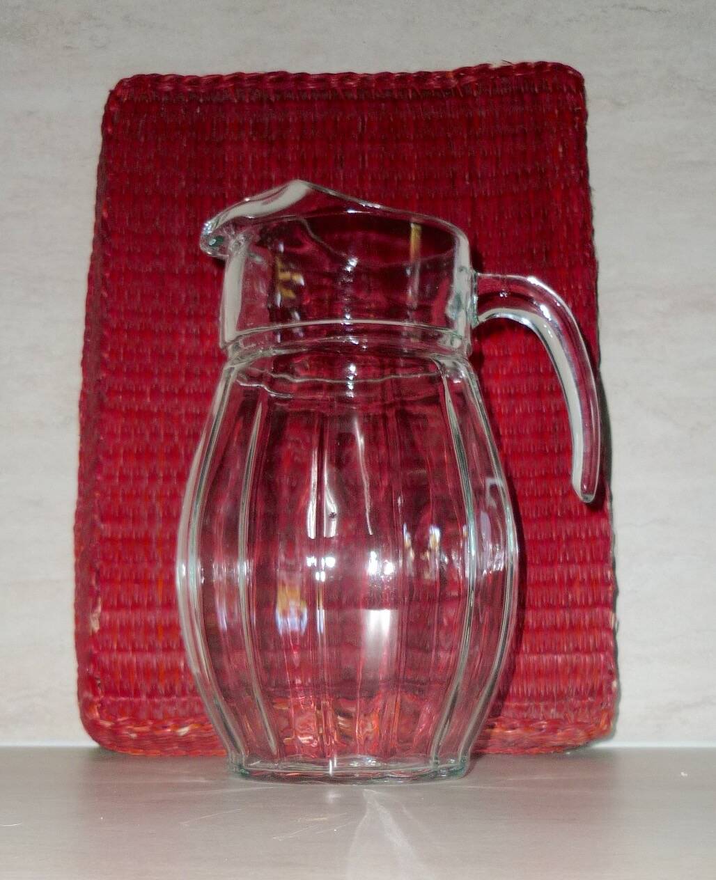 Vintage transparent molded glass carafe with handle