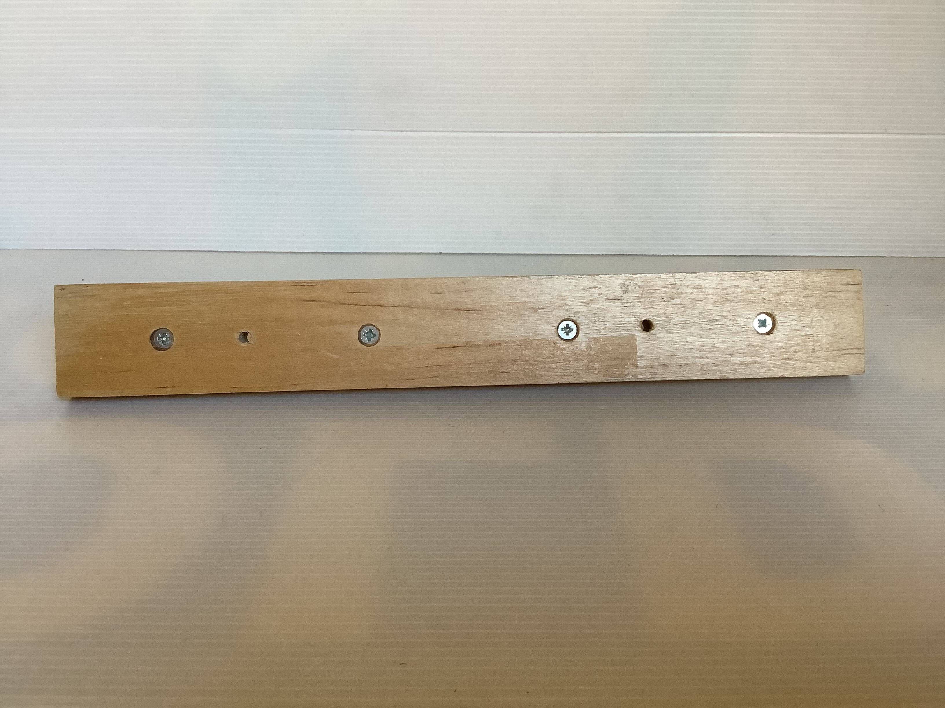 Wooden metal ball tea towel holder