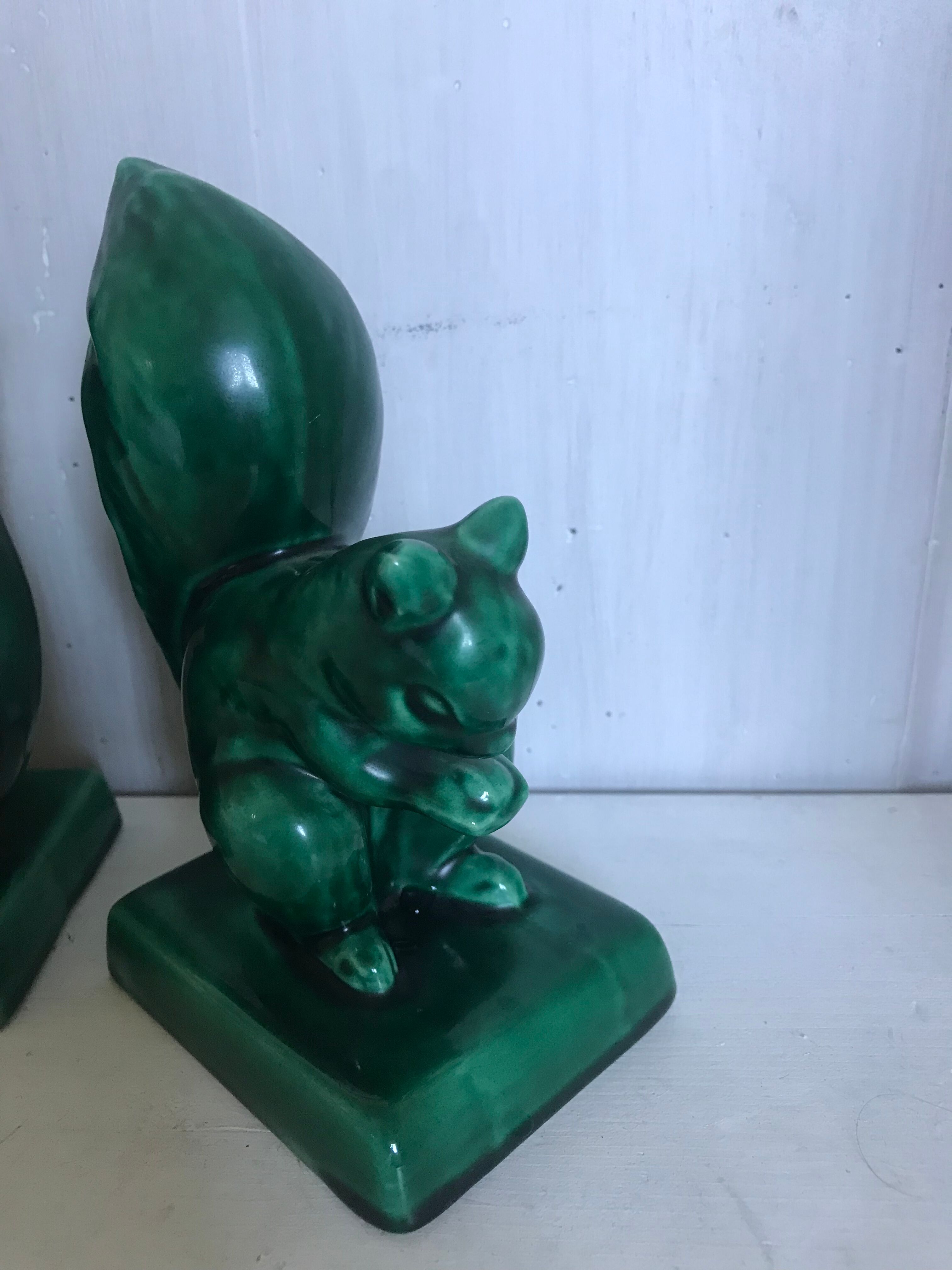 Pair of Art Deco ceramic book clamts