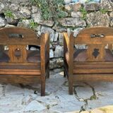 Pair of armchairs in stained wood and leather, 20th century