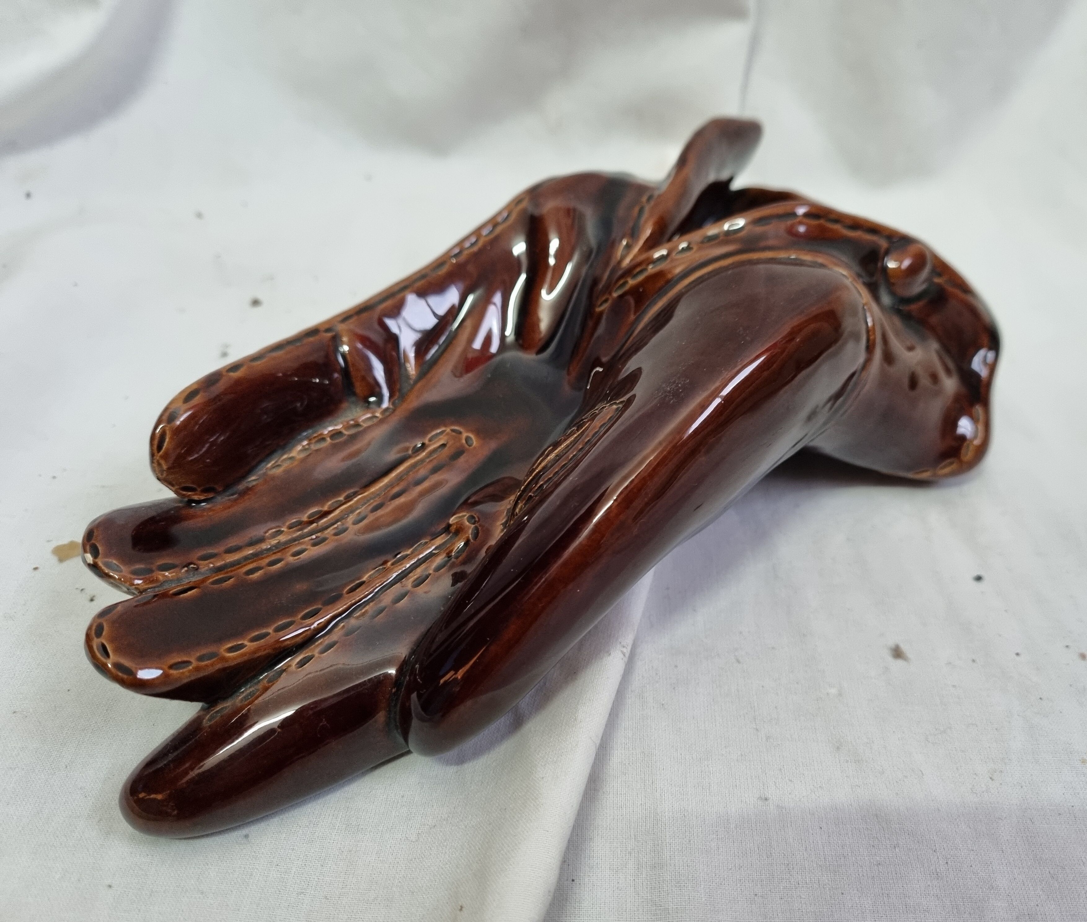 Ceramic ashtray in the shape of a glove from 1970