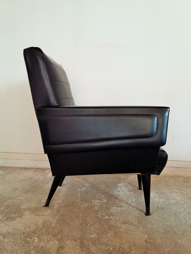 Black armchair of the 1950s