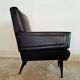 Black armchair of the 1950s