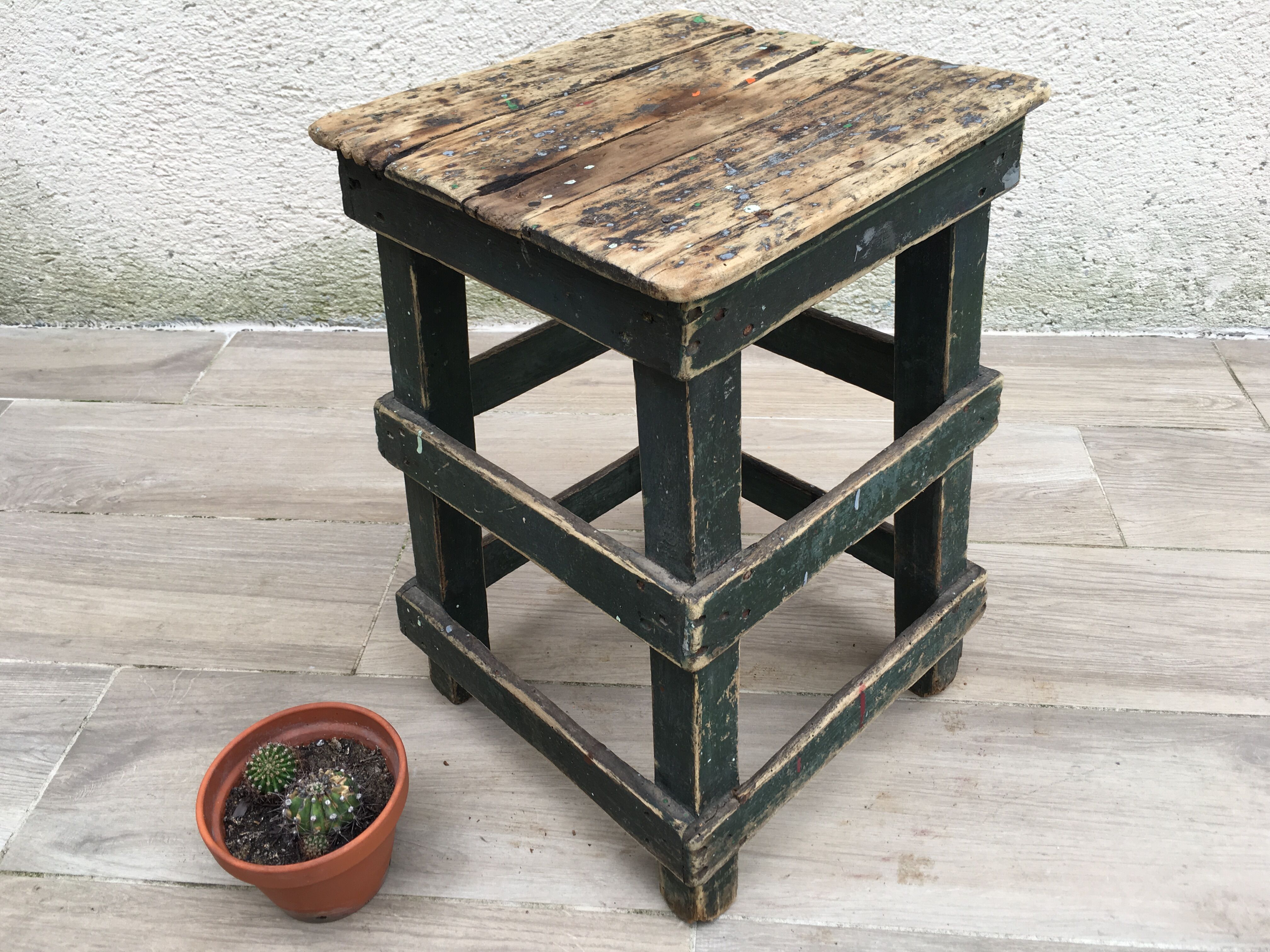 Former green workshop stool