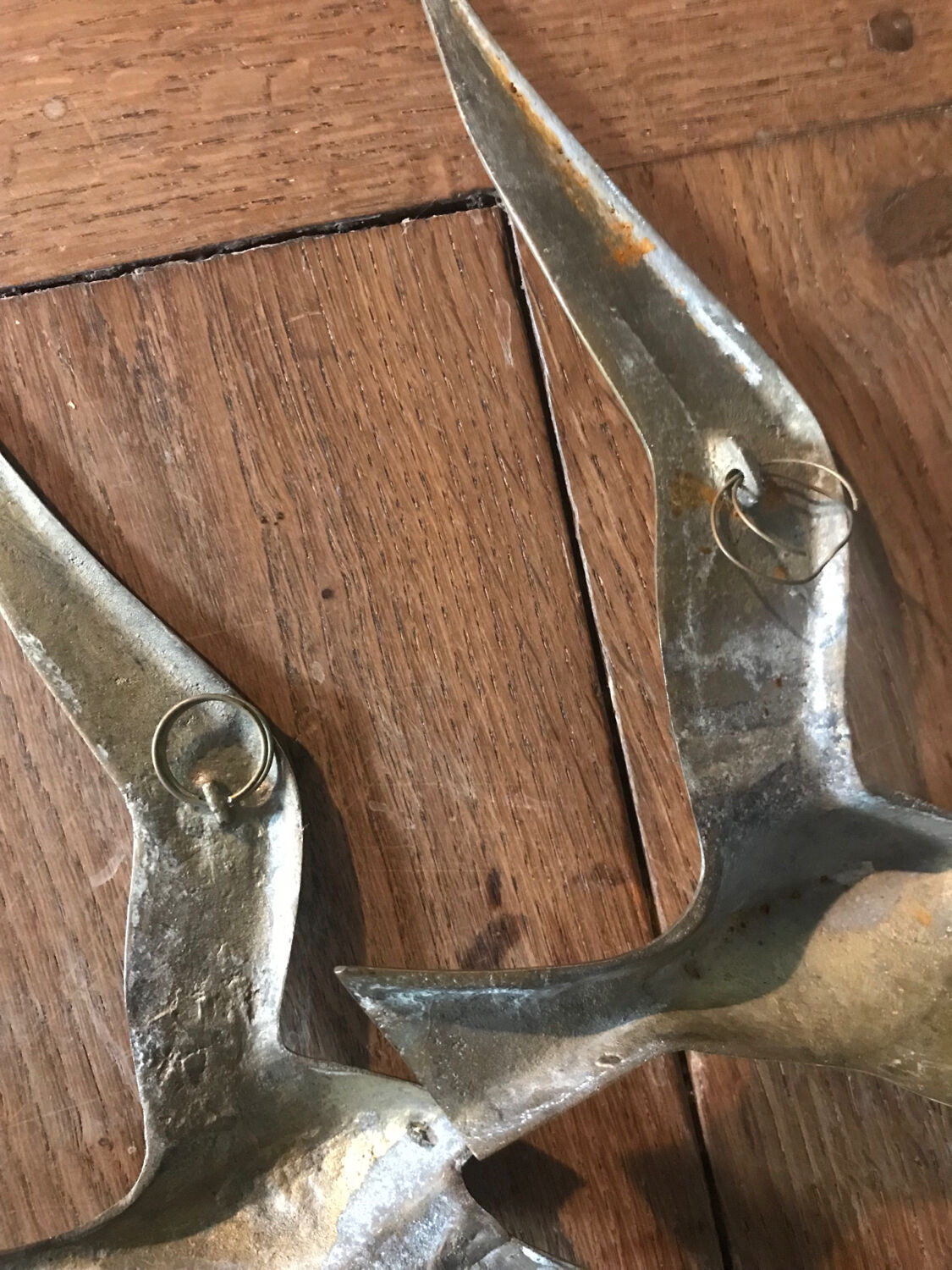 Pair of brass swallows