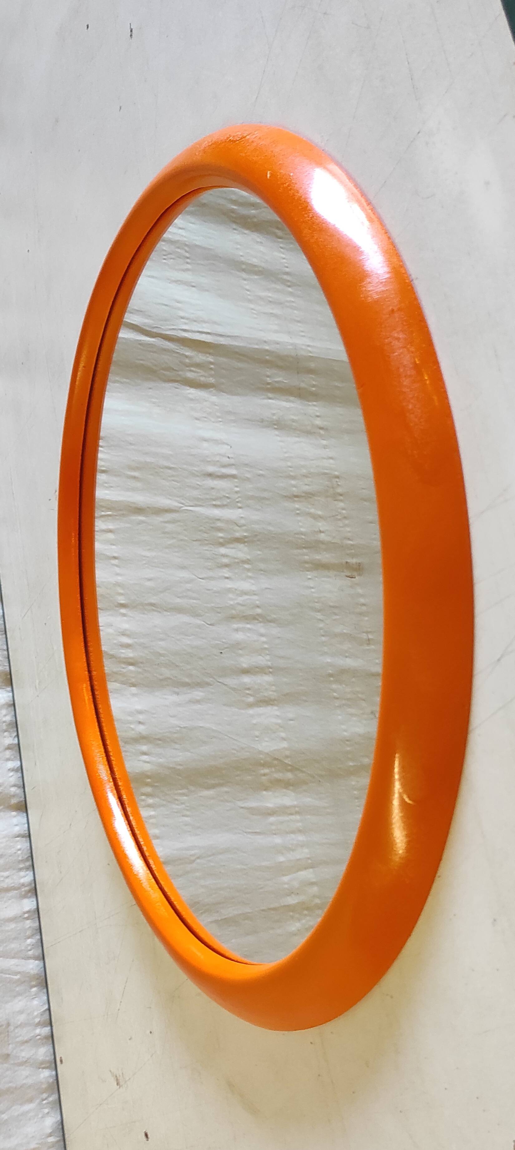 Orange oval mirror - 1970s