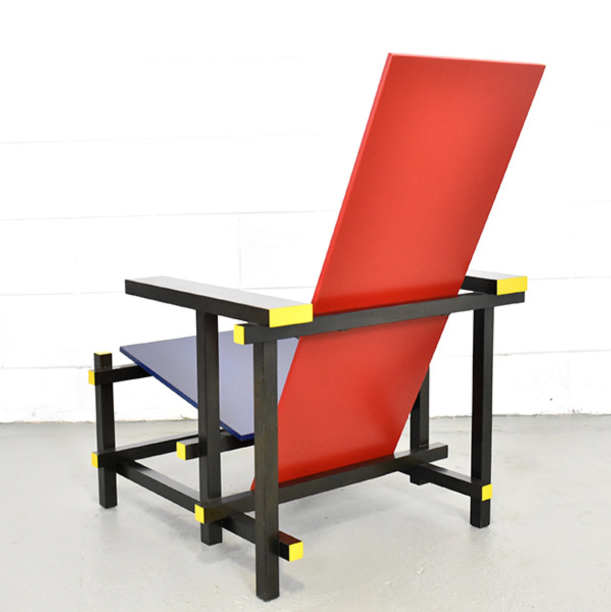 Fauteuil rouge et bleue par Gerrit Rietveld pour Cassina  Selency